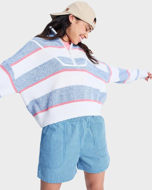 Image of a model wearing Shorts. Productname: roxy Womens Stay Wavy Mid Denim Shorts Coconut Milk Denim Stripe - in Coconut Milk Denim Stripe colour by brand - Roxy