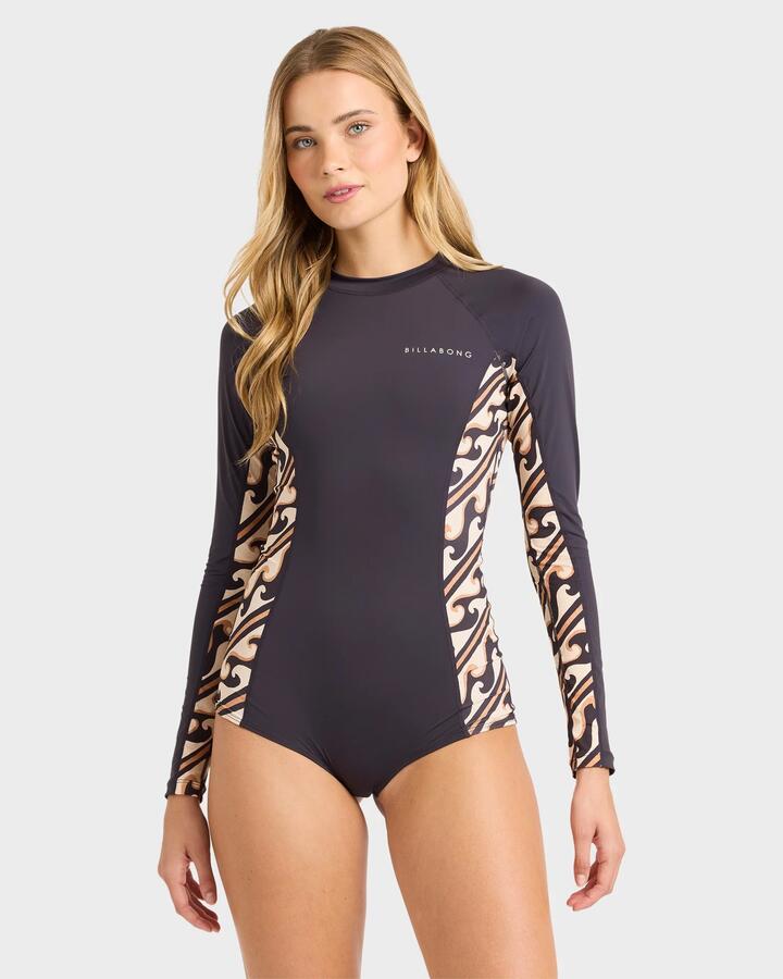 Image of a model wearing Tops. Productname: billabong Womens Dark Wave Long Sleeve Rashvest Black Pebble - in Black Pebble colour by brand - Billabong