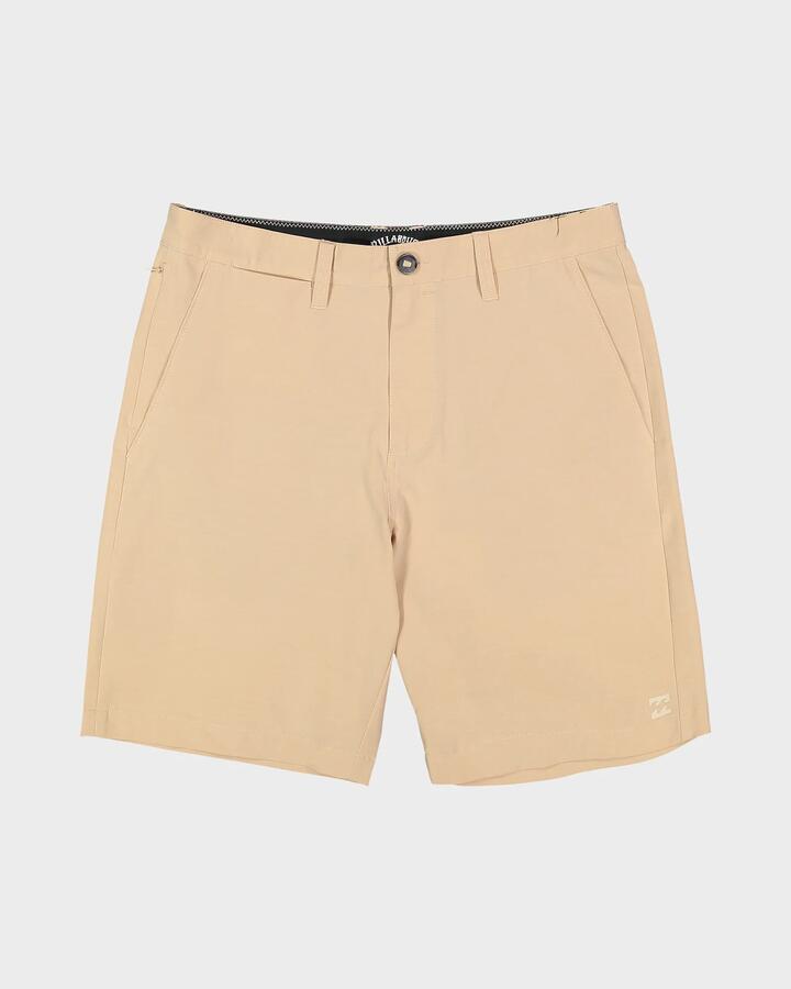 Image of a model wearing Shorts. Product name - Billabong Mens Primary Submers 19" Hybrid Shorts Oatmeal in Oatmeal colour by brand - Billabong