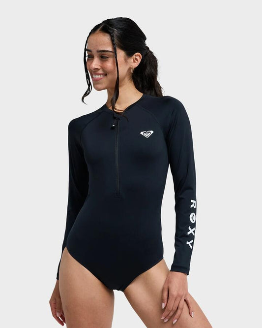 Image of a model wearing Tops. Productname: roxy - Womens Essentials Long Sleeve One Piece Rash Vest - Anthracite - in Anthracite colour by brand - roxy