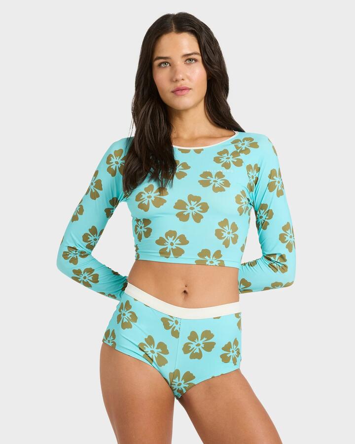 Image of a model wearing Tops. Productname: billabong - Womens Last Summer Cropped Long Sleeve Rashvest - Ocean Spray - in Ocean Spray colour by brand - billabong