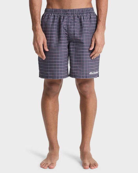 Image of a model wearing Shorts. Product name - Quiksilver Mens Mercury Volley 18" Swim Shorts Black Mercury Mini Check in Black Mercury Mini Check colour by brand - Quiksilver