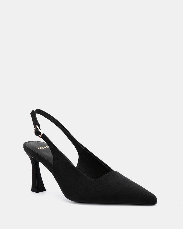 Image of a model wearing Pants. Product name - Iylah Black Suede Pumps in Black colour by brand - Novo