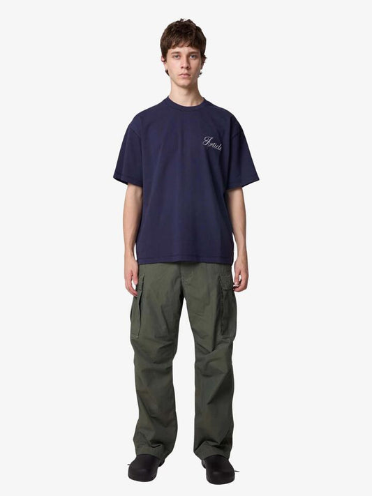 Image of a model wearing Tops. Productname: Article One Double Script Tee in Navy colour by brand - Article One