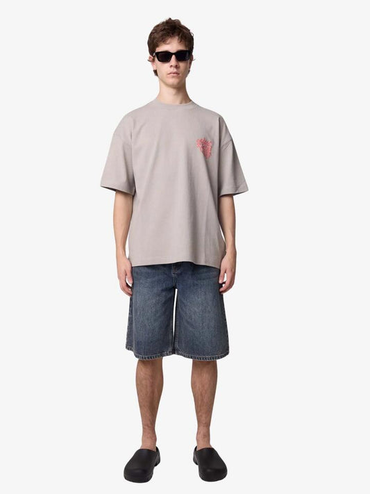 Image of a model wearing Tops. Productname: Article One Fragile Flower Tee in Grey colour by brand - Article One