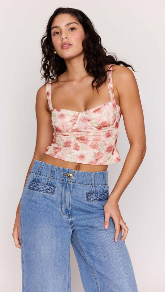 Image of a model wearing Tops. Product name - Pink Floral Buster Mesh Crop Top in Pink Floral colour by brand - MINKPINK