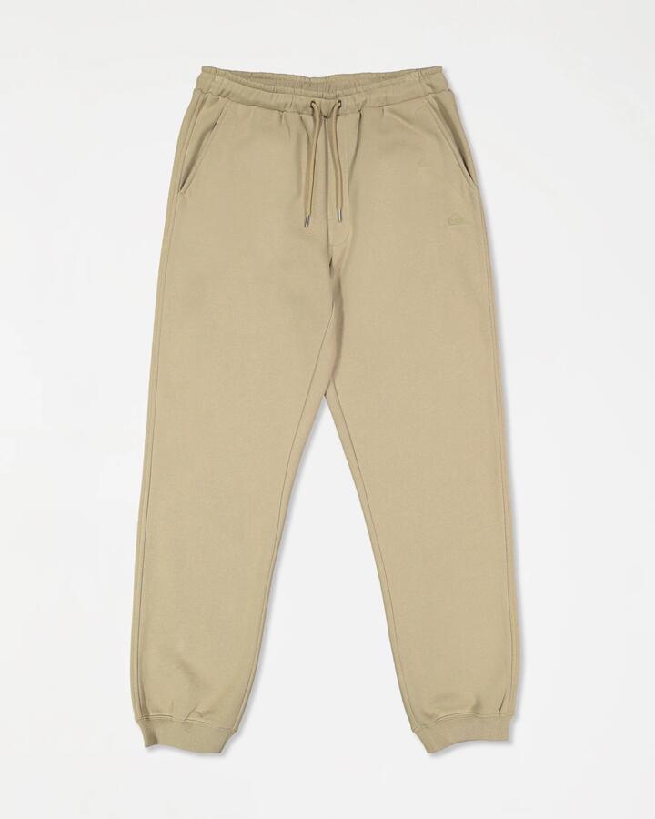 Image of a model wearing Pants. Product name - Quiksilver Mens Salt Water Trackpants Seneca Rock in Seneca Rock colour by brand - Quiksilver