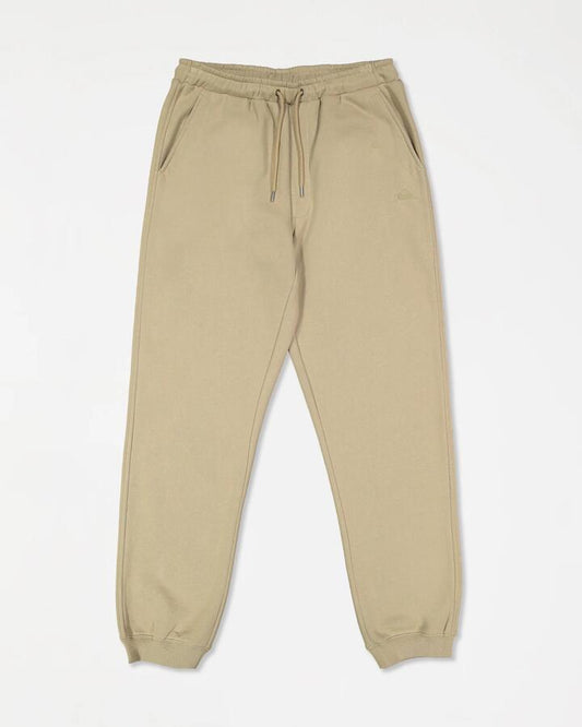 Image of a model wearing Pants. Product name - Quiksilver Mens Salt Water Trackpants Seneca Rock in Seneca Rock colour by brand - Quiksilver