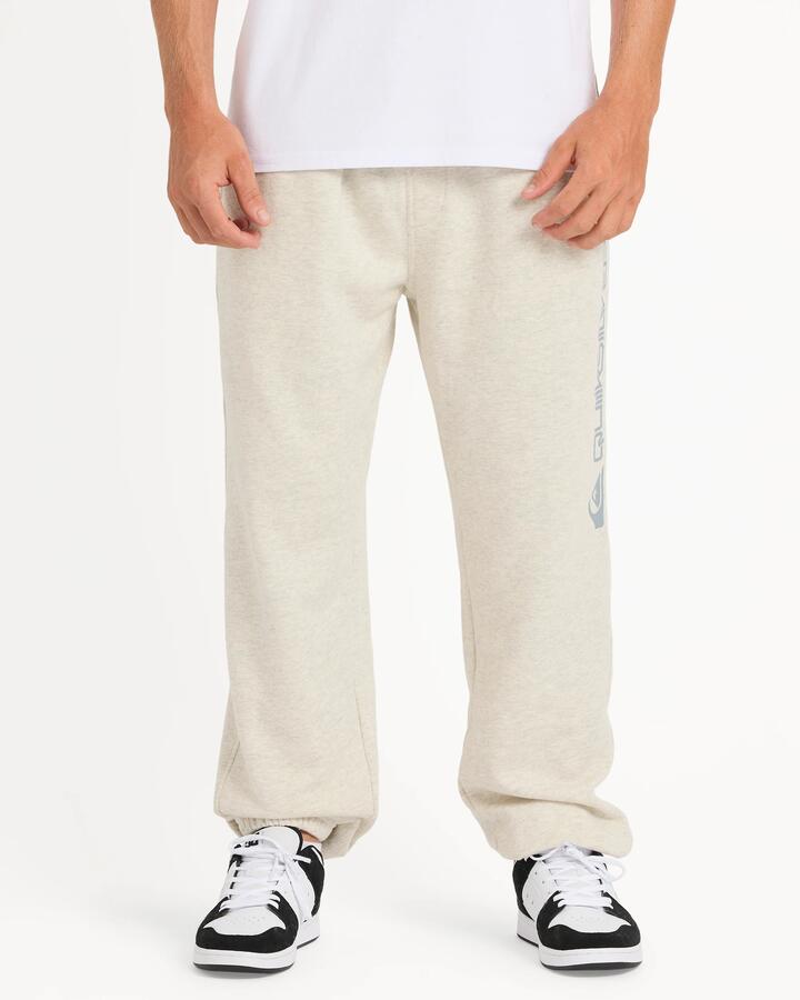 Image of a model wearing Pants. Product name - Quiksilver Mens Graphic Track Pants Light Grey Heather in Light Grey Heather colour by brand - Quiksilver