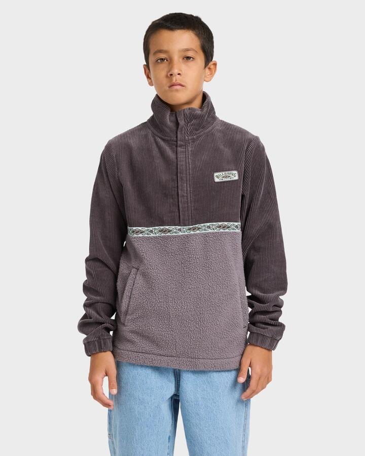 Image of a model wearing Outerwear. Product name - Billabong Boys 8-16 Space Lobs Mock Neck Fleece Top Washed Black in Washed Black colour by brand - Billabong