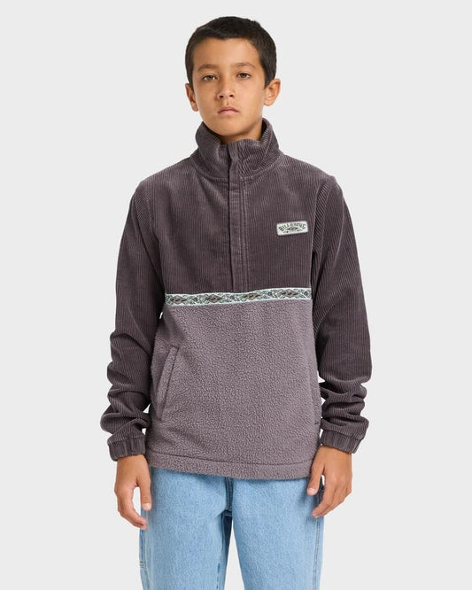 Image of a model wearing Outerwear. Product name - Billabong Boys 8-16 Space Lobs Mock Neck Fleece Top Washed Black in Washed Black colour by brand - Billabong