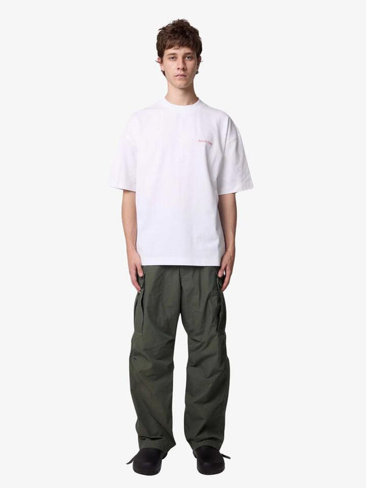 Image of a model wearing Tops. Productname: Article One Cactus World Tee in White colour by brand - Article One