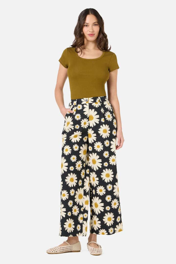 Image of a model wearing Pants. Productname: 60's Daisy Pant in Black colour by brand - Princess Highway