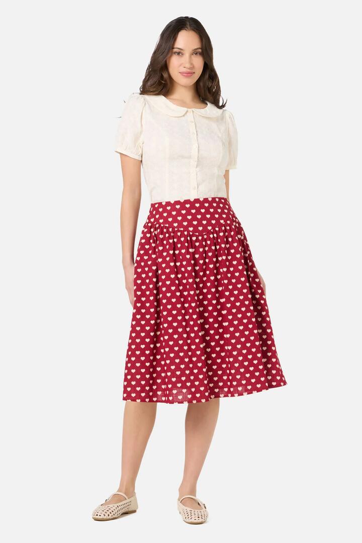 Image of a model wearing Skirts. Productname: Sweet Heart Gathered Skirt in Red colour by brand - Princess Highway