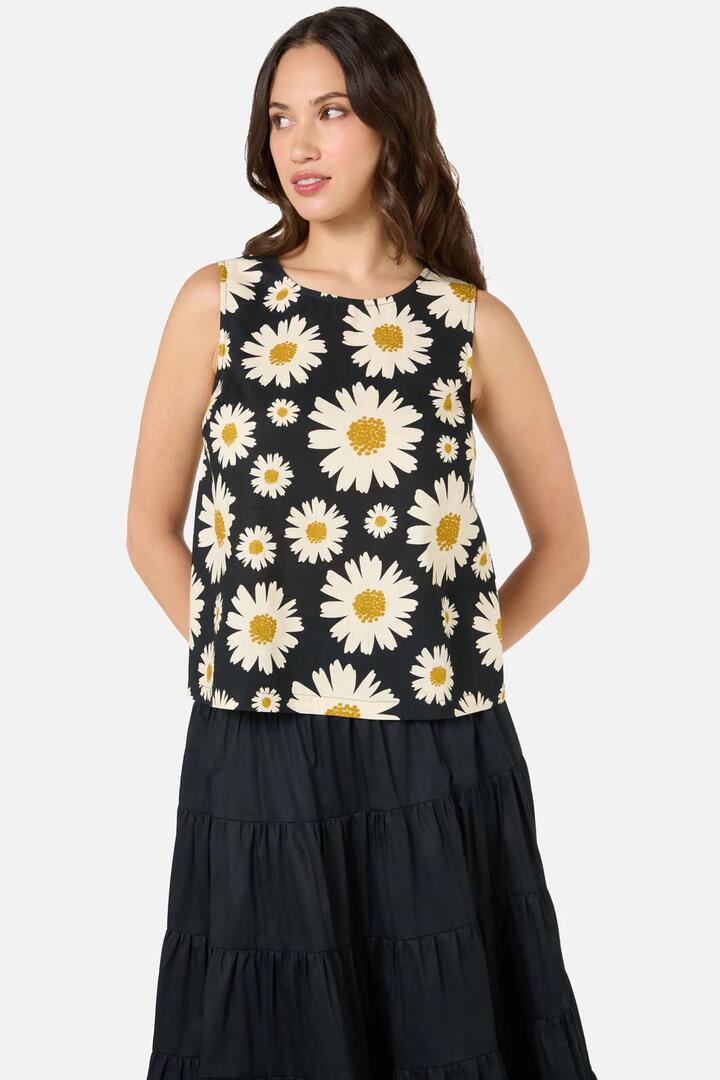 Image of a model wearing Tops. Product name - 60'S Daisy Shell Top in Black colour by brand - Princess Highway