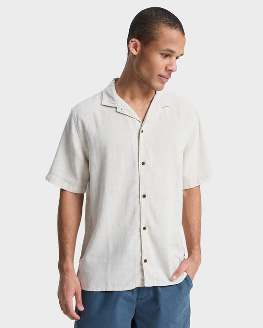 Image of a model wearing Tops. Productname: quiksilver - Mens Sunrise Short Sleeve Shirt - Bone - in Bone colour by brand - quiksilver