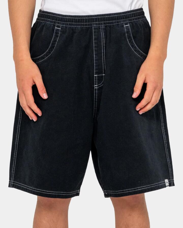 Image of a model wearing Shorts. Product name - Rusty Mens Flip Daddy Elastic Baggy Walkshorts Black in Black colour by brand - Rusty