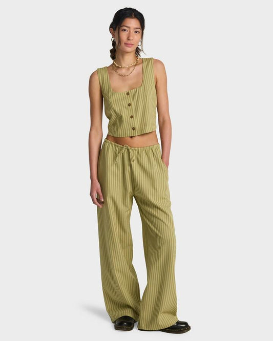Image of a model wearing Pants. Productname: billabong - Womens Another Wave Elastic Waist Pants - Cedar - in Cedar colour by brand - billabong