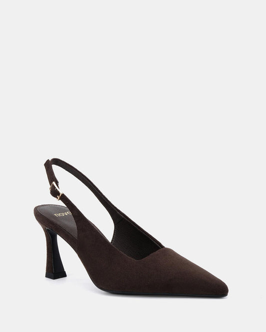 Image of a model wearing Pants. Product name - Iylah Espresso Suede Pumps in Espresso Suede colour by brand - Novo