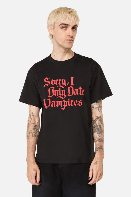 Image of a model wearing Tops. Productname: Vampire Lover Unisex Tee in Black colour by brand - Pulp Kitchen