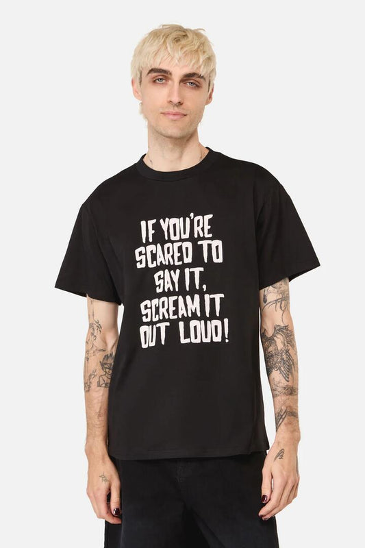 Image of a model wearing Tops. Productname: Scared Unisex Tee in Black colour by brand - Pulp Kitchen