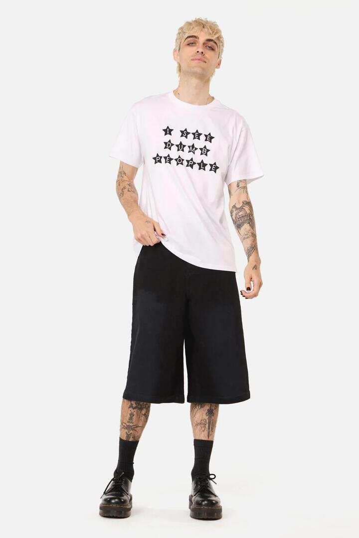 Image of a model wearing Tops. Productname: Dumb People Unisex Tee in Black colour by brand - Pulp Kitchen
