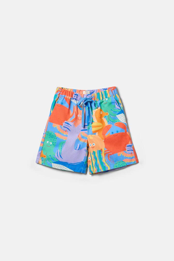 Image of a model wearing Shorts. Product name - Under The Sea Kids Shorts in Blue colour by brand - Gorman