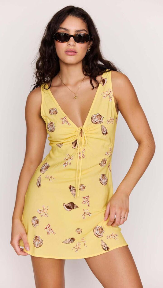 Image of Dresses. Product name - Yellow Printed ECOVERO Summer Mini Dress in Butter Seashells colour by brand - MINKPINK