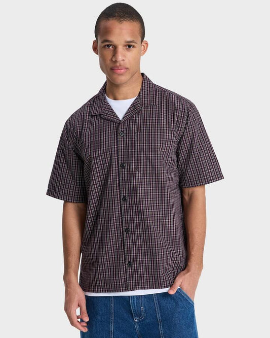 Image of a model wearing Tops. Productname: quiksilver - Mens Mercury Double Zero Short Sleeve Shirt - Black Double Zero - in Black Double Zero colour by brand - quiksilver
