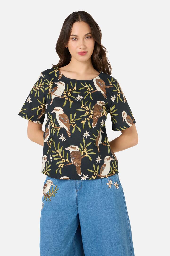 Image of a model wearing Tops. Product name - Kookaburra Short Sleeve Top in Black colour by brand - Princess Highway
