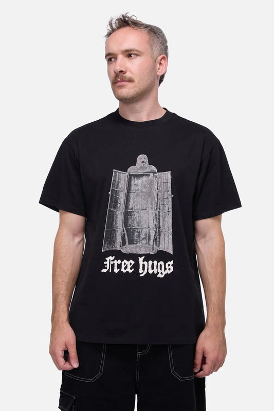 Image of a model wearing Tops. Productname: Free Hugs Unisex Tee in Black colour by brand - Pulp Kitchen