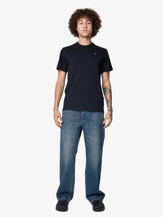 Image of a model wearing Tops. Productname: G-Star Nifous T-Shirt in Dark Black colour by brand - G-Star