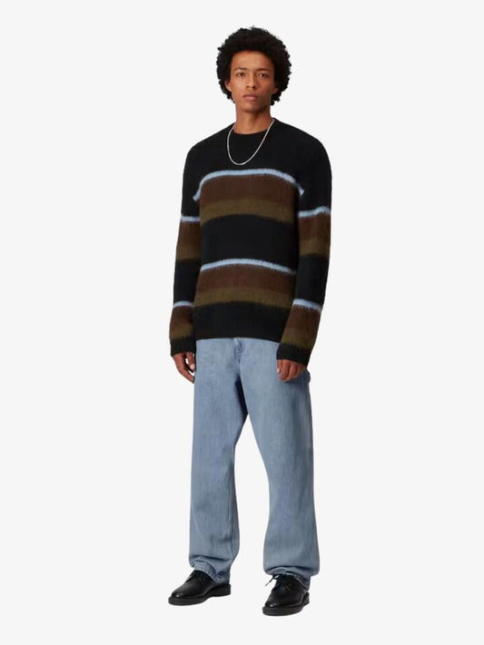 Image of a model wearing Pants. Productname: Carhartt Wip Single Knee Pant in Blue Stone Bleached colour by brand - Carhartt Wip