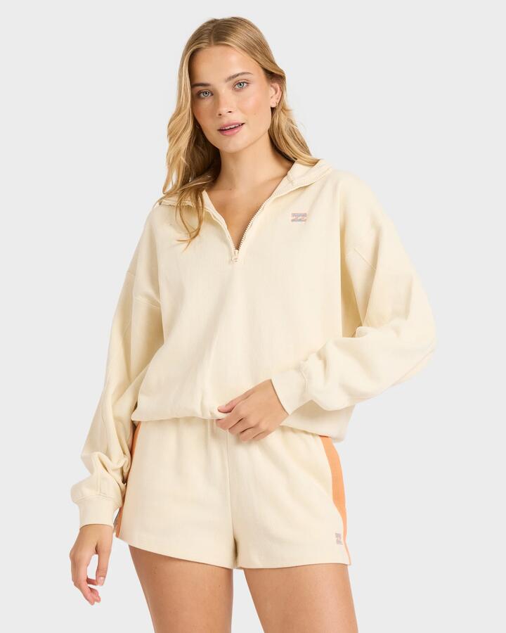 Image of a model wearing Outerwear. Productname: billabong - Womens Classic Feels Half Zip Fleece Top - White Cap - in White Cap colour by brand - billabong