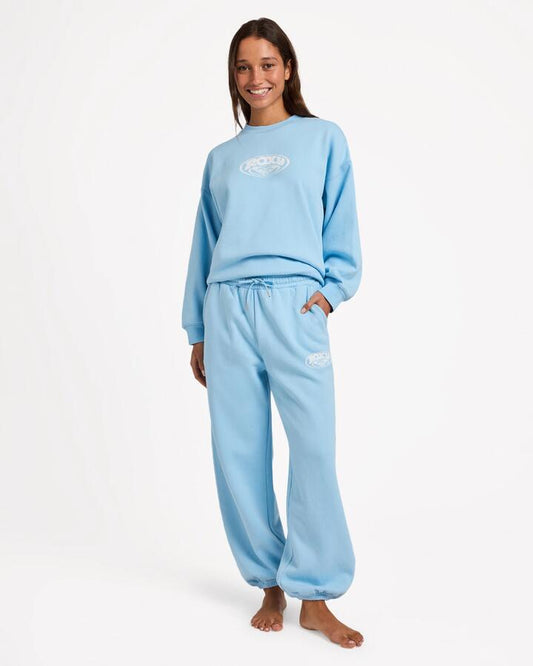 Image of a model wearing Pants. Productname: roxy Womens Dreamy Days Trackpants Sky Blue - in Sky Blue colour by brand - Roxy