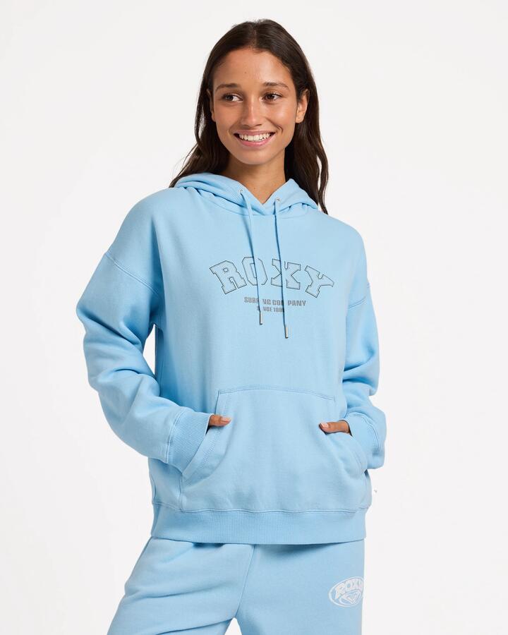 Image of a model wearing Outerwear. Product name - Roxy Womens Dreamy Days Pullover Hoodie Sky Blue in Sky Blue colour by brand - Roxy