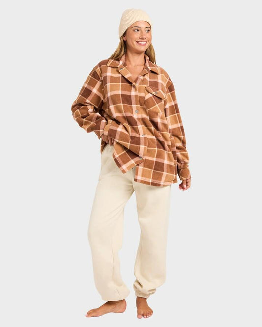 Image of a model wearing Pants. Productname: quiksilver Womens Omni Star Trackpants Sandshell - in Sandshell colour by brand - Quiksilver