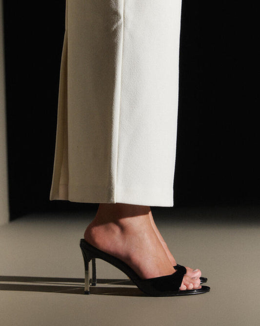 Image of Sandals. Product name - Zabelle Black Patent Mules in Black colour by brand - Novo