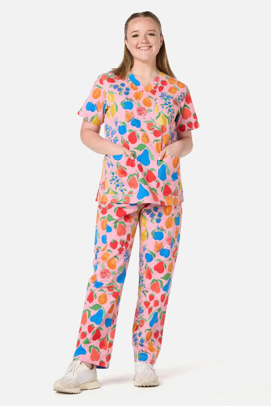Image of a model wearing Uniforms & Workwear. Productname: Fruit Bowl Scrub Set in Pink colour by brand - Scrubs With Love