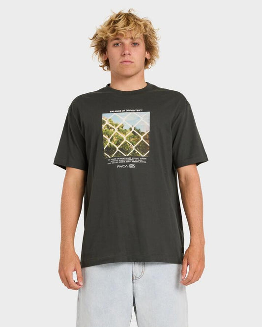 Image of a model wearing Tops. Productname: rvca Mens Thru View T-Shirt Pirate Black - in Pirate Black colour by brand - Rvca