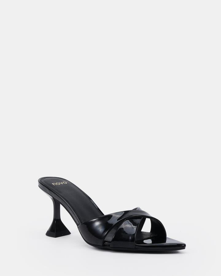 Image of Sandals. Product name - Zayna Black Patent Mules in Black colour by brand - Novo