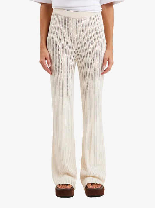 Image of a model wearing Pants. Productname: LIIDO Lana Crochet Pants in Off White colour by brand - LIIDO