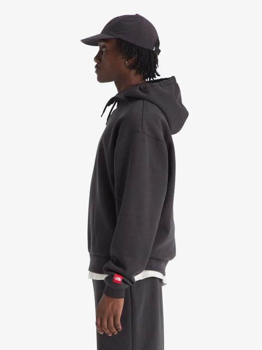 Image of a model wearing Outerwear. Productname: The North Face Men's Red Box Hoodie in Obsidian colour by brand - The North Face