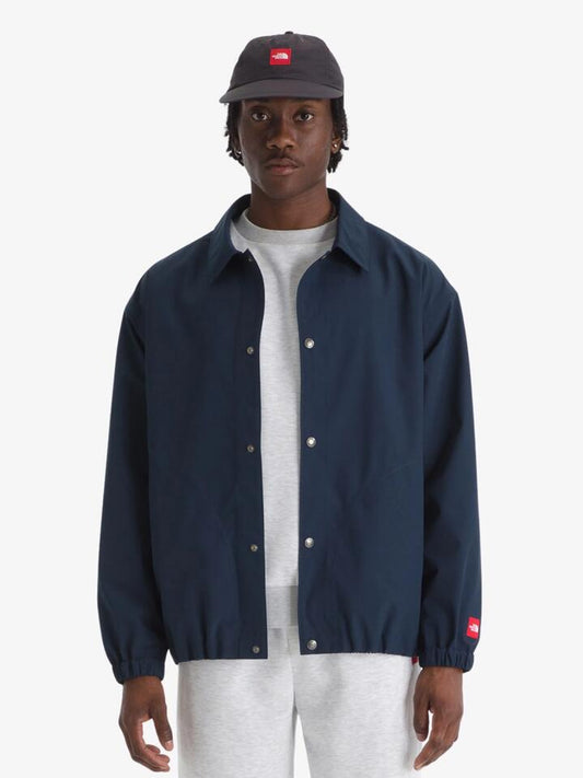 Image of a model wearing Outerwear. Productname: The North Face Men's Red Box Dryvent Coaches Jacket in Summit Navy colour by brand - The North Face
