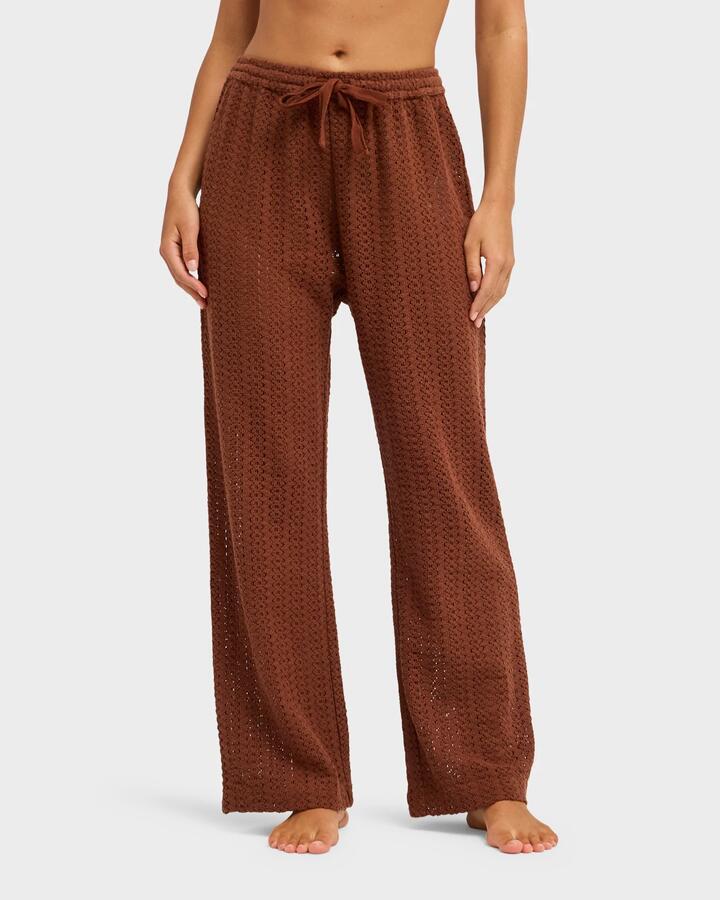 Image of a model wearing Pants. Product name - Roxy Womens Mood Moving Cover Up Pants Cappuccino in Cappuccino colour by brand - Roxy