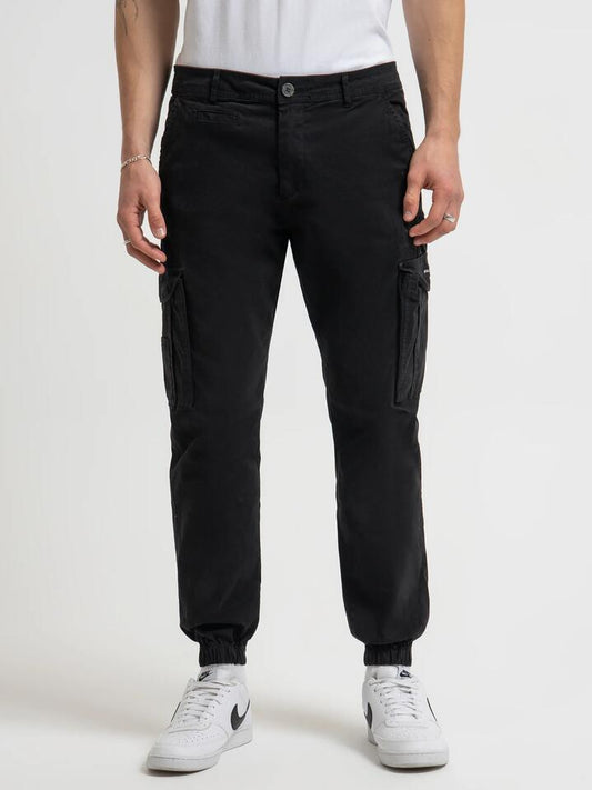 Image of a model wearing Pants. Productname: Henleys Eagle Pants in Black colour by brand - Henleys