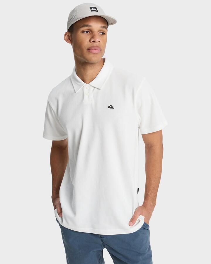 Image of a model wearing Shorts. Productname: quiksilver Mens Mw Pique Polo Short Sleeve Shirt Snow White - in Snow White colour by brand - Quiksilver
