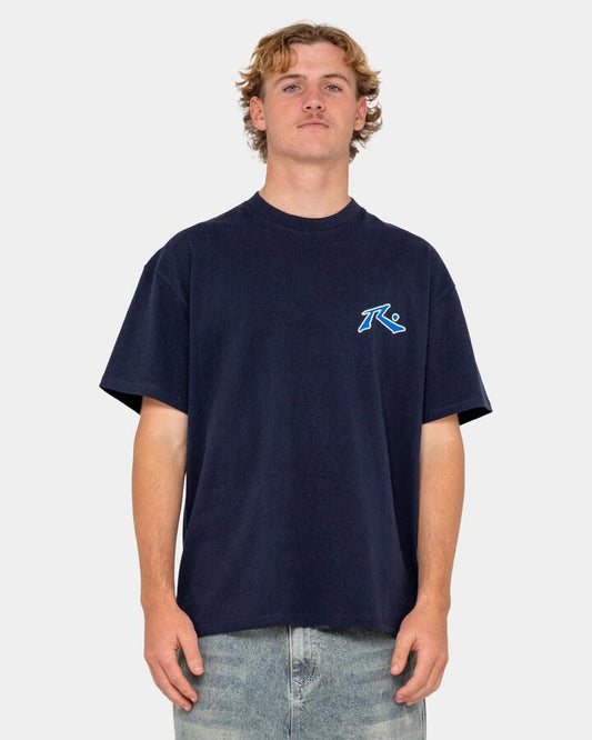 Image of a model wearing Tops. Productname: rusty Mens Competition 2.0 T-Shirt Navy Blue - in Navy Blue colour by brand - Rusty