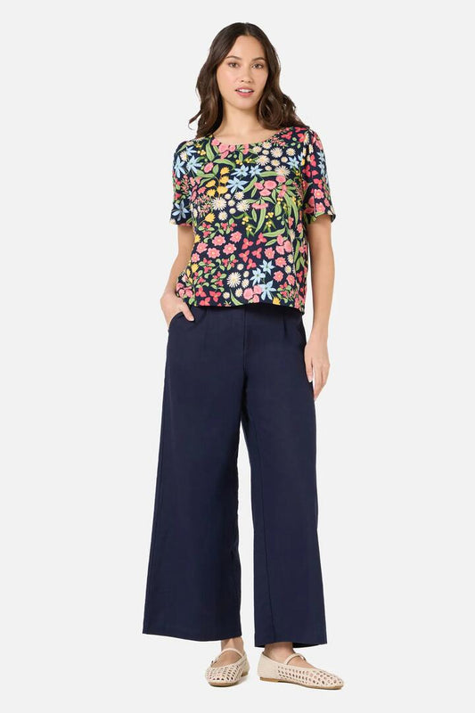 Image of a model wearing Tops. Productname: Liberty Native Sleeved Top in Navy colour by brand - Princess Highway