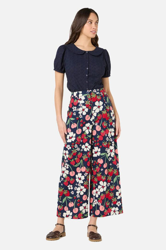 Image of a model wearing Pants. Productname: Berries N Cream Pant in Navy colour by brand - Princess Highway